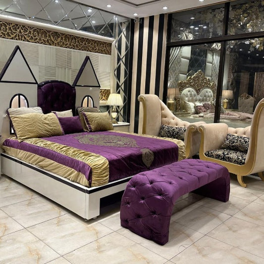 Royal Purple Velvet Bed with Golden Accents and Castle-Shaped Headboard