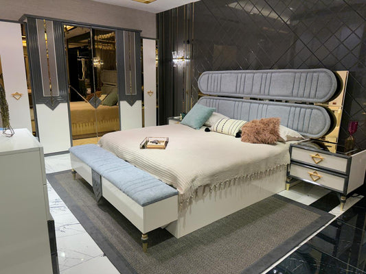 Elegant Modern Bedroom Suite with Plush Upholstery and Chic Accents