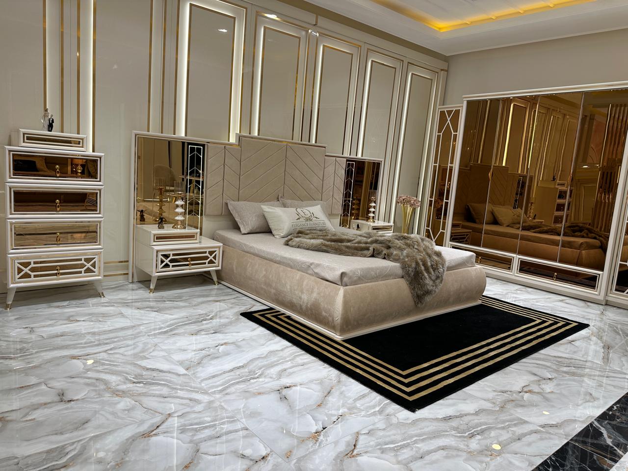 Opulent Marble Bedroom Suite with Luxurious Gold Accents