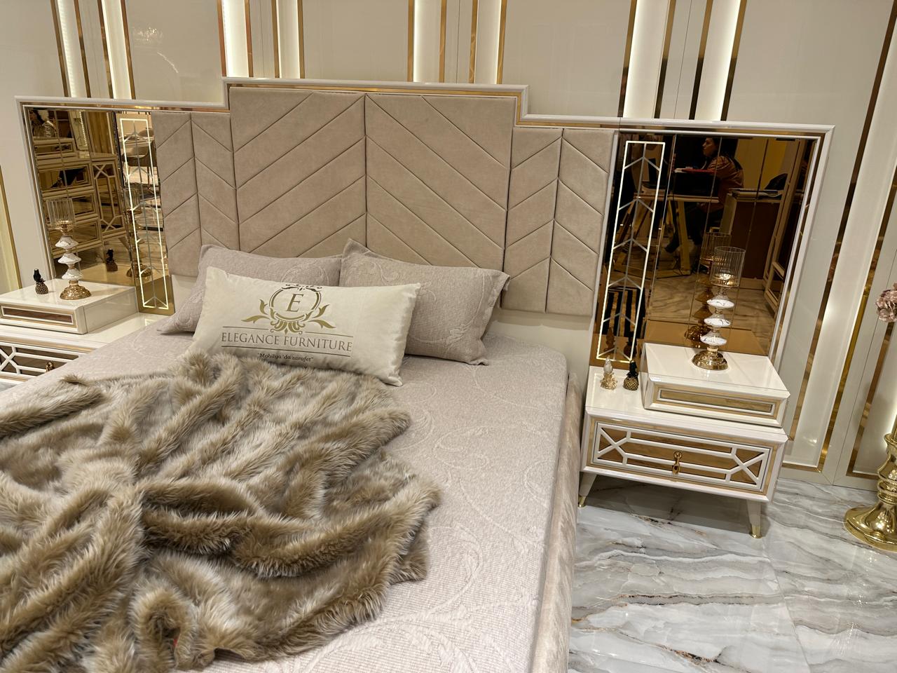 Opulent Marble Bedroom Suite with Luxurious Gold Accents