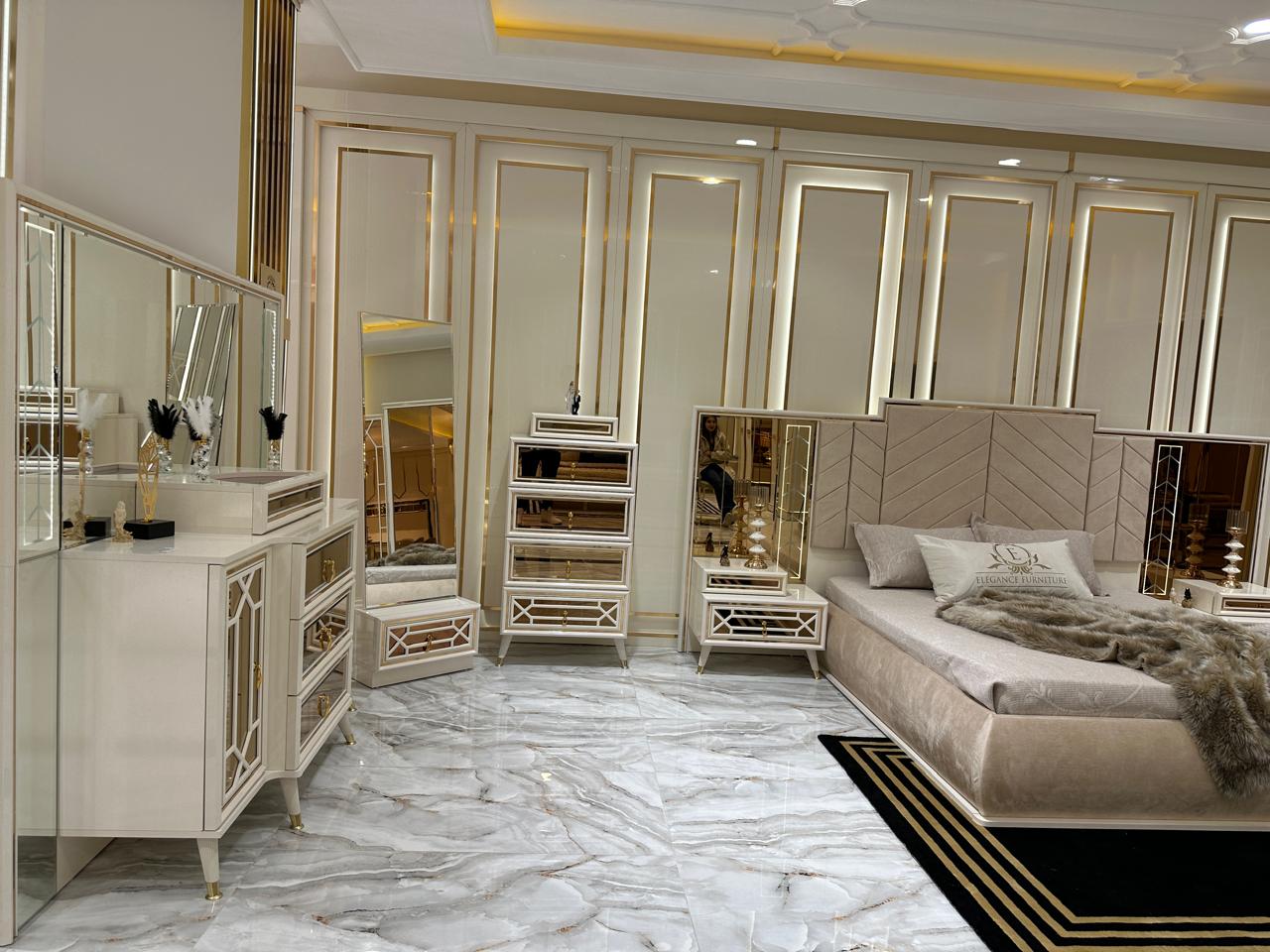 Opulent Marble Bedroom Suite with Luxurious Gold Accents