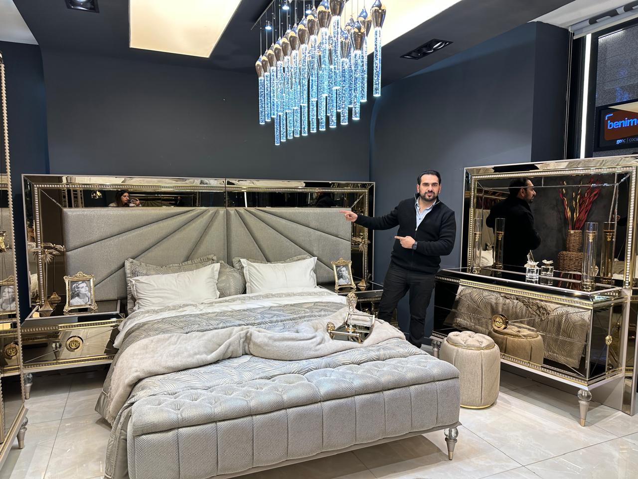 Luxury Silver Bedroom Suite with Mirrored Accents and Modern Chandelier