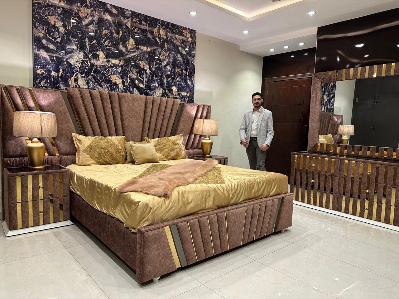 Luxurious Modern Bedroom Suite with Gold Accents and Elegant Design