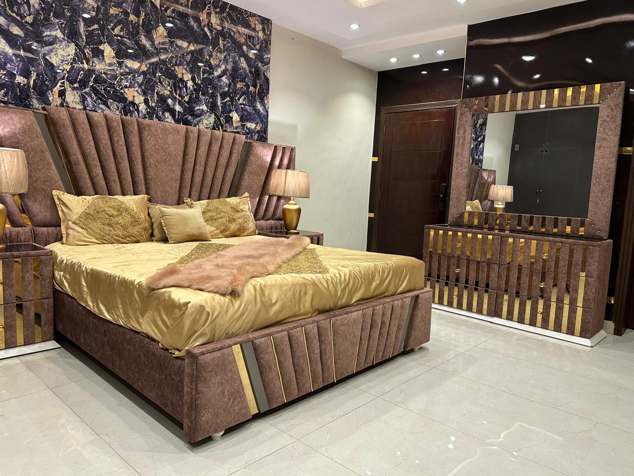 Luxurious Modern Bedroom Suite with Gold Accents and Elegant Design