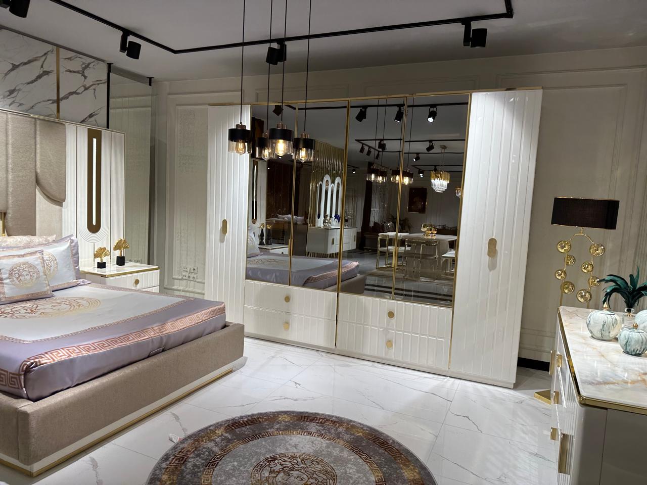 Elegant Modern Bedroom Suite with Luxurious Textures and Gold Accents