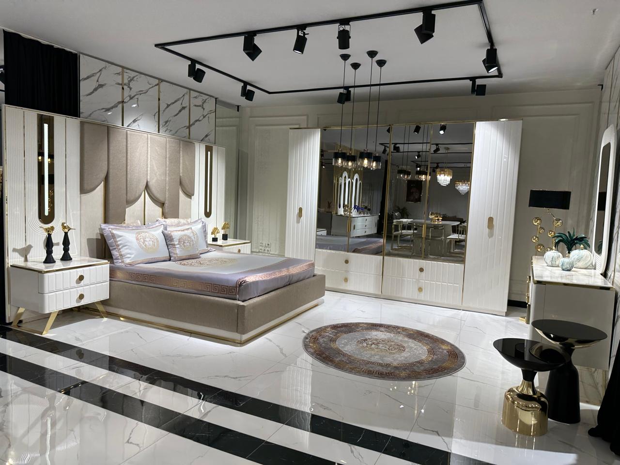 Elegant Modern Bedroom Suite with Luxurious Textures and Gold Accents