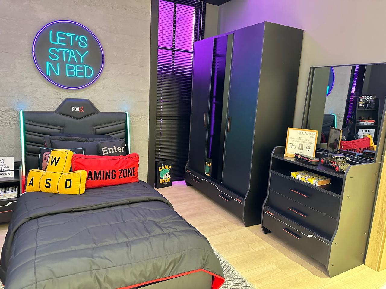 Ultimate Gamer's Bedroom Suite with Neon Decor and Ergonomic Setup